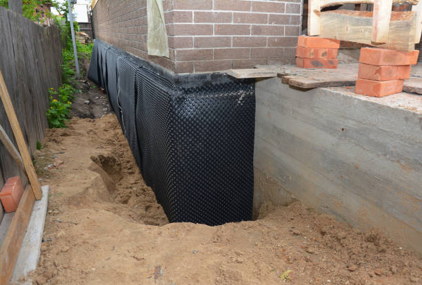 Happy homeowners after waterproofing job in Piscataway